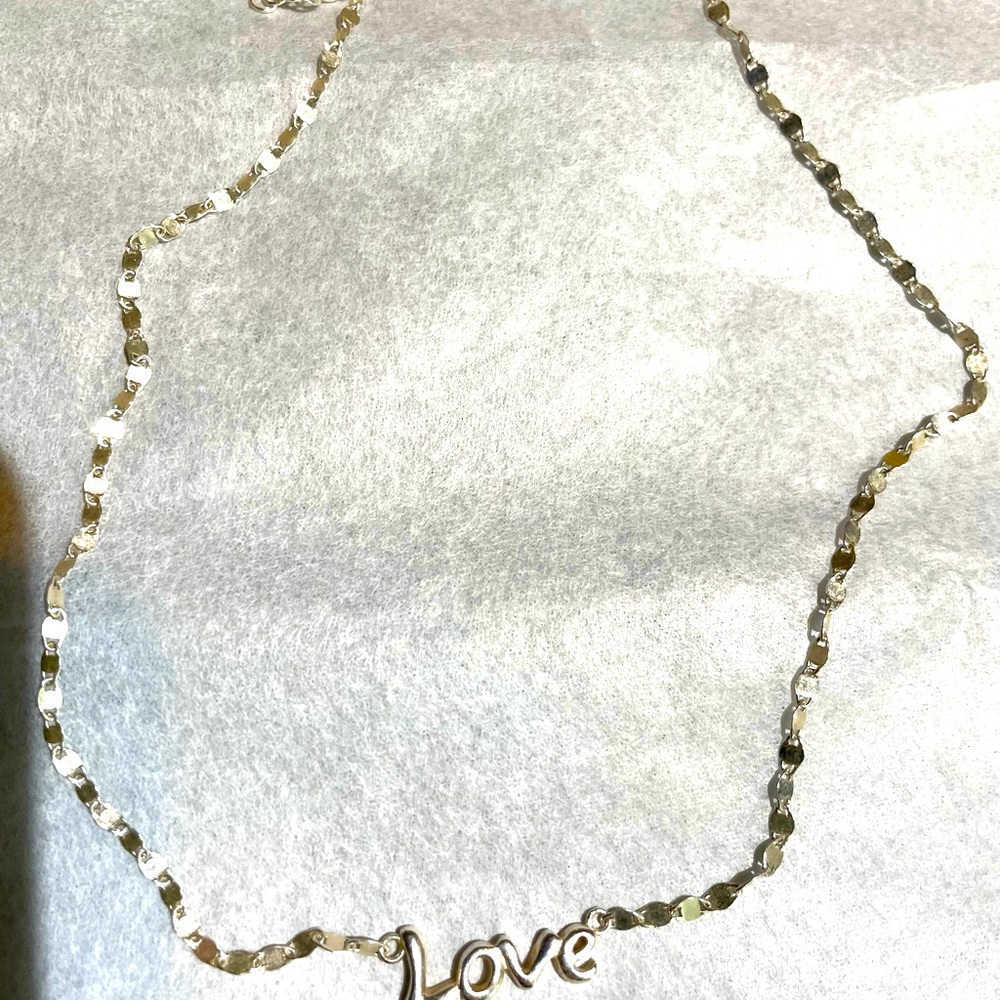 Silver “love” necklace